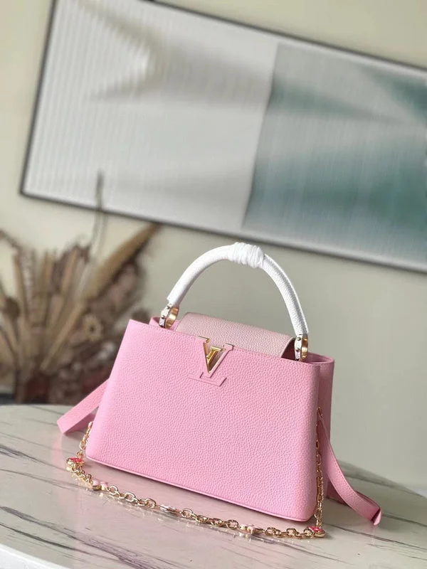 Ladies Louis Vuitton Petite Malle bags in a pastel color for a soft lookLouis Vuitton Bags