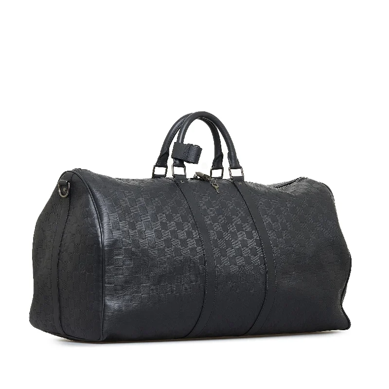 Louis Vuitton bags with a snap - button closure and a decorative charm for styleLouis Vuitton Damier Infini Keepall Bandouliere 55 (SHG-11QoKd)