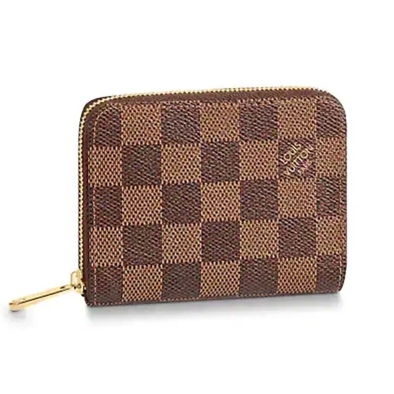 Louis Vuitton Speedy bags in monogram canvas for a classic lookLouis Vuitton LV Unisex Zippy Coin Purse Damier Ebene Canvas