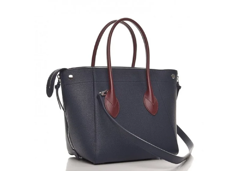 Louis Vuitton Speedy bags in monogram canvas for a classic lookLouis Vuitton Freedom Handbag Navy Blue