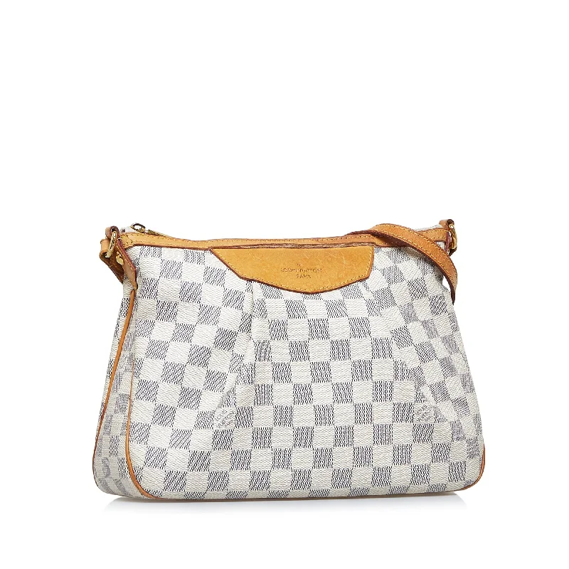 Louis Vuitton crossbody bags with a woven leather strap for textureLOUIS VUITTON Damier Azur Siracusa PM Crossbody Bag