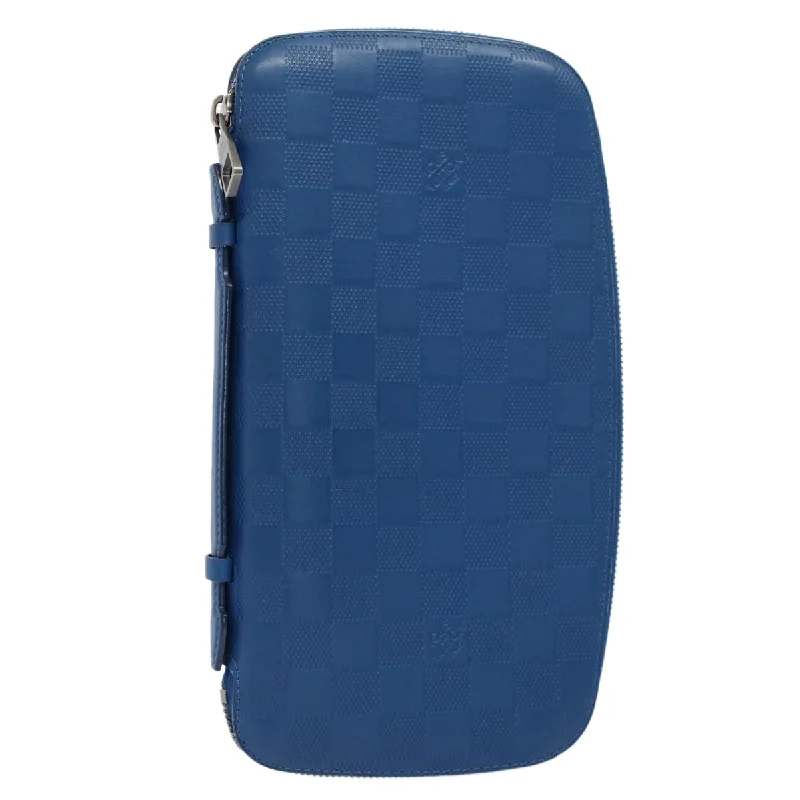 Louis Vuitton Twist bags with a crystal - embellished LV - turnlockLOUIS VUITTON Damier Infini  Organizer Atholl Clutch Bag Blue M30653 Auth ki3459