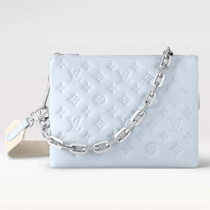 Louis Vuitton Alma bags featuring the signature top - handle designLouis Vuitton LV Women Coussin PM Handbag Ice Blue Lambskin Cowhide Leather