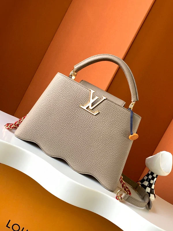 Louis Vuitton Twist bags with a crystal - embellished LV - turnlockLouis Vuitton Bags