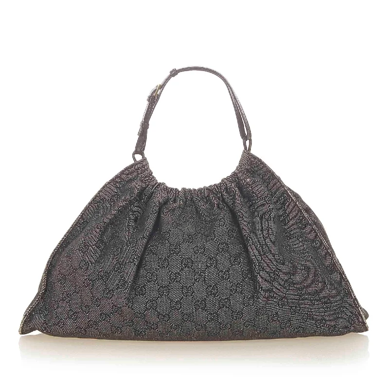 Women Gucci bags with a chain - link trim and a leather bodyGucci GG Canvas Handbag