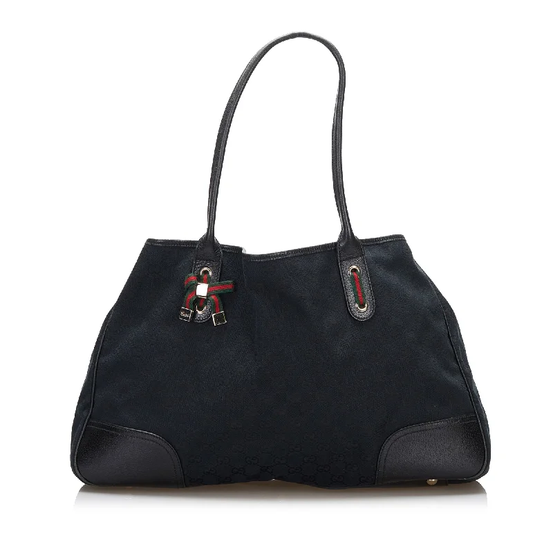 Women Gucci Sylvie bags featuring the signature web stripeGucci GG Canvas Princy Tote Tote Bag