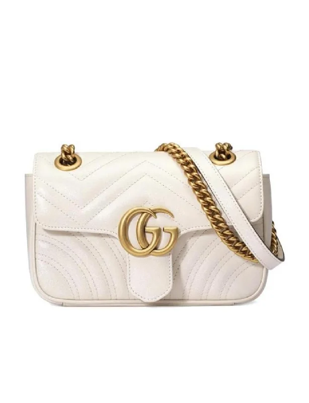 Women Gucci crossbody bags with a printed floral patternGucci GG Marmont Series Mini Shoulder Bag