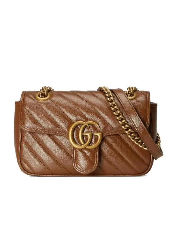 Women Gucci Sylvie bags featuring the signature web stripeGucci GG Marmont Series Mini Shoulder Bag