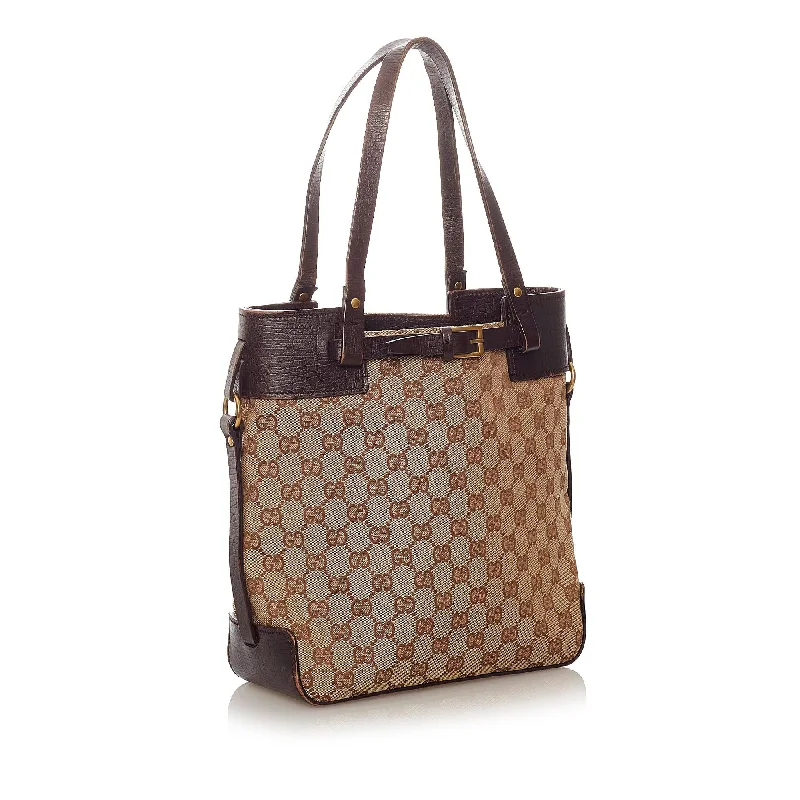 Women Gucci bags with a chain - link trim and a leather bodyGucci GG Canvas Tote Bag (27892)