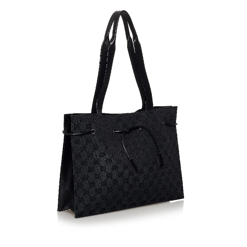 Women Gucci Sylvie bags with a monogram - embossed leatherGucci GG Canvas Tote Bag (29956)