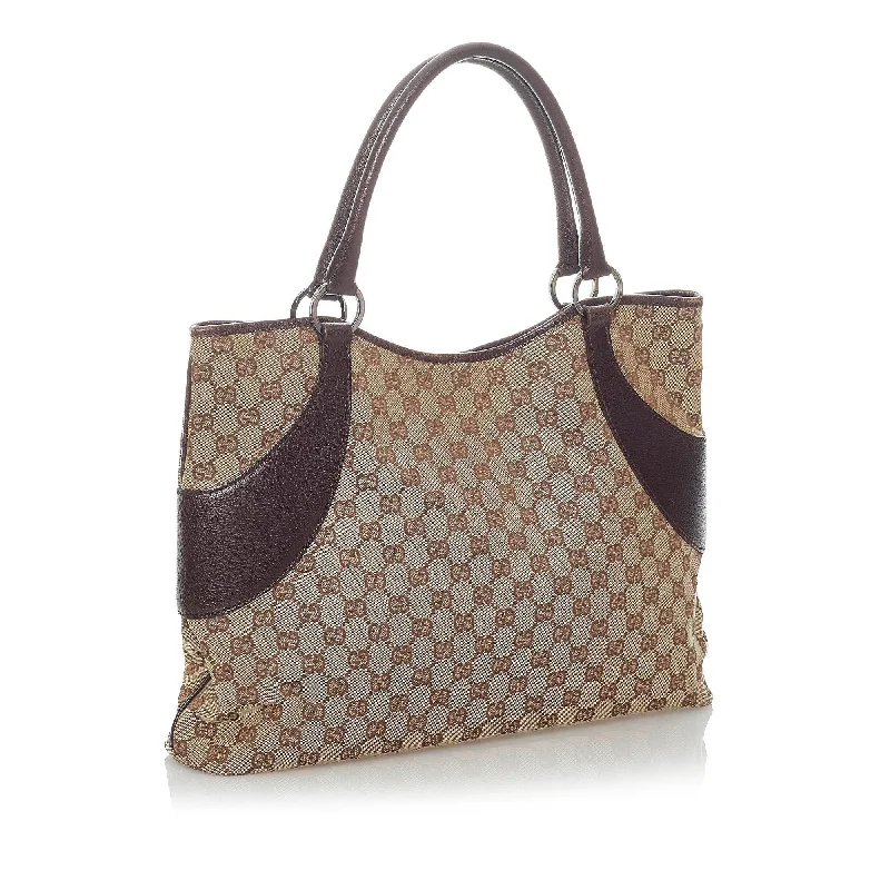 Women Gucci backpacks with a luxurious leather finishGucci GG Canvas Tote Bag (31015)