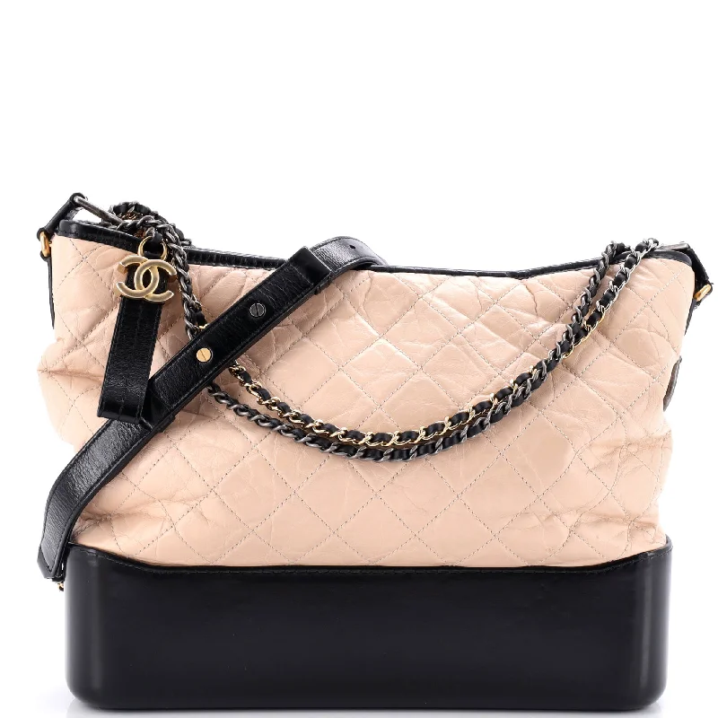 Christian Dior Saddle bags with a distressed leather finishBicolor Gabrielle Hobo Quilted Aged Calfskin Large