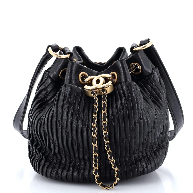 Christian Dior Saddle bags with a studded trim for a bold lookCoco Pleats Drawstring Bag Pleated Crumpled Calfskin Small