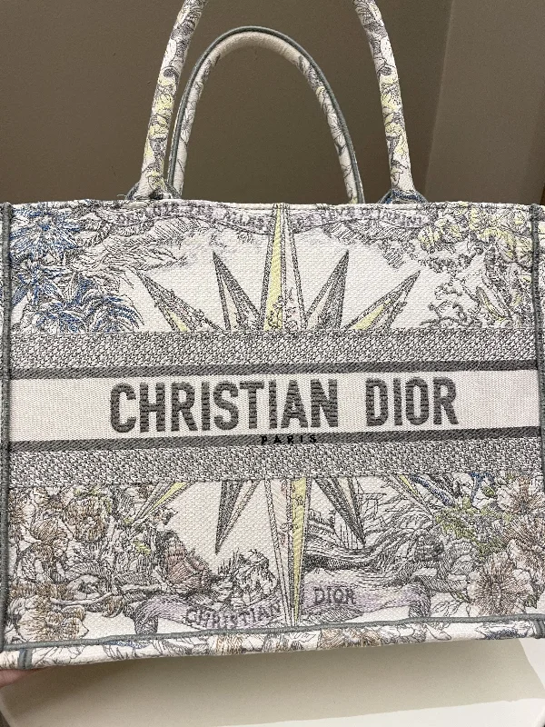 Stylish Christian Dior shoulder bags with a tassel - adorned zipperDior Reve d'Infini Book Tote Ivory / Multicolor Embroidery